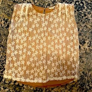 Entro sleeveless shirt. Lace and nude color. Size small.
